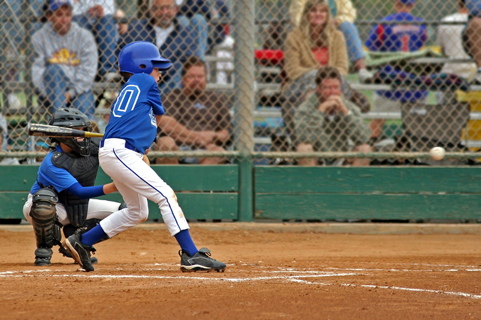 Youth playing baseball